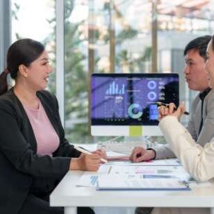 business-team-analyzing-financial-data-on-computer-2025-10-13-22-46-27-utc