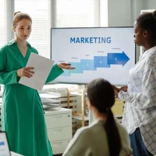 woman-giving-business-presentation-for-colleagues-2025-03-10-08-02-09-utc